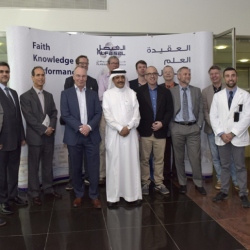 President HE Dr.Mohamed Alhayaza and Dean Nouredine Zettili pose with the KFIP winners